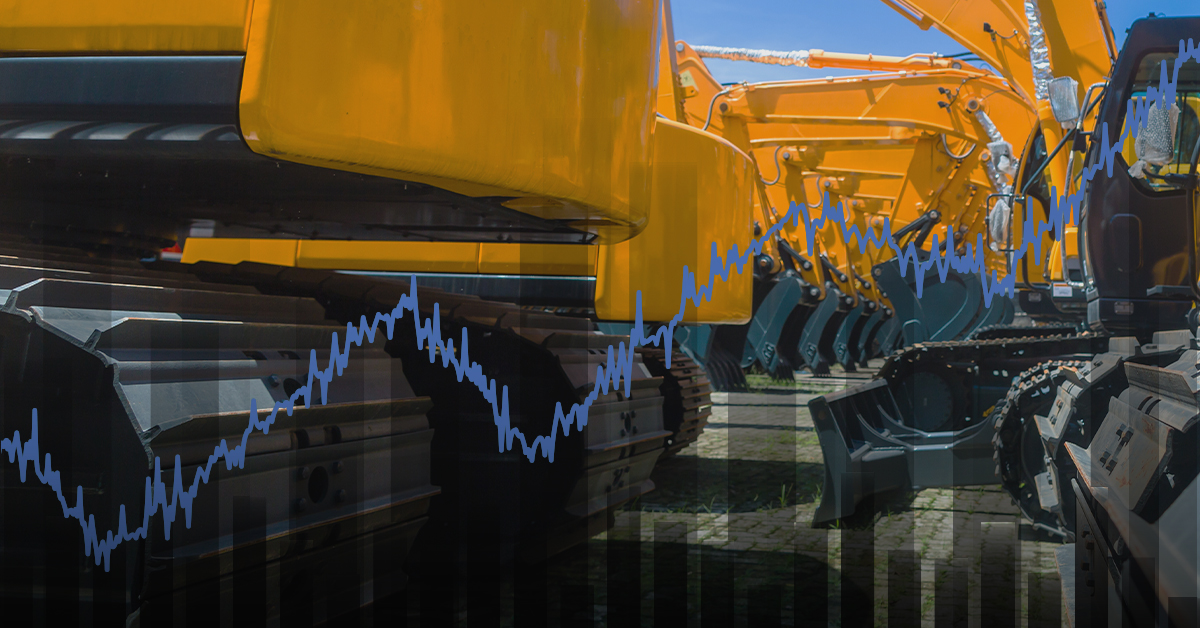Different types of heavy equipment are parked side by side with an inclined line graph.