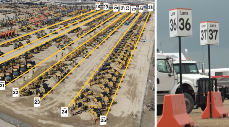 An aerial view of the parked heavy equipment in the auction yard.