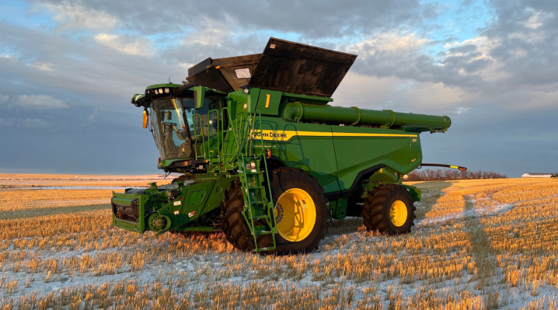2023 John Deere X9 1100 on a farm field.