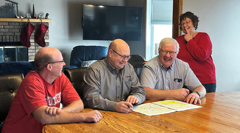 Customers chat with a Ritchie Bros. representative. 